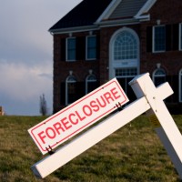 Banks Dodge Expected Wave of Foreclosures