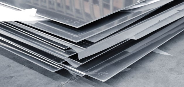 Stack of solid steel aluminum plates 630