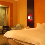 hotel-room-bed-eccentric-millionaire