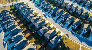 an aerial picture of multiple houses