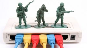 toy soliders standing on top of a router 