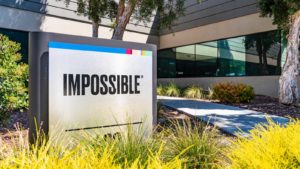 Impossible Foods logo on a sign outside of a corporate building