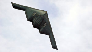 A photograph of the underside of a Northrop Grumman stealth bomber.