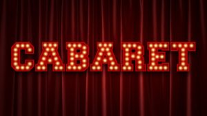 the word cabaret displayed upon a red curtain