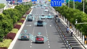 a road populated by self driving cars