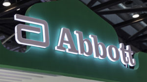 Abbott (ABT) sign with lighting behind letters