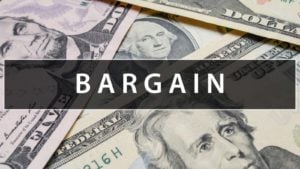 the word bargain over a pile of american money to represent cheap stocks, stocks under $20