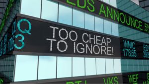 a computer rendering of an LED sign on a building saying "Too cheap to ignore" representing cheap stocks