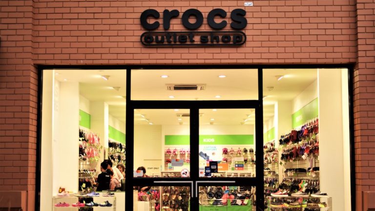 CROX stock - Crocs (CROX) Stock Plummets Despite Record Revenue