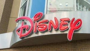 the Disney logo in red font on a storefront