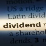 The word "dividend" highlighted in a dictionary.