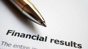 Image of a pen resting on a paper that reads "financial results" representing VRT stock.