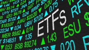 ETFs: A stock market ticker tape that reads 