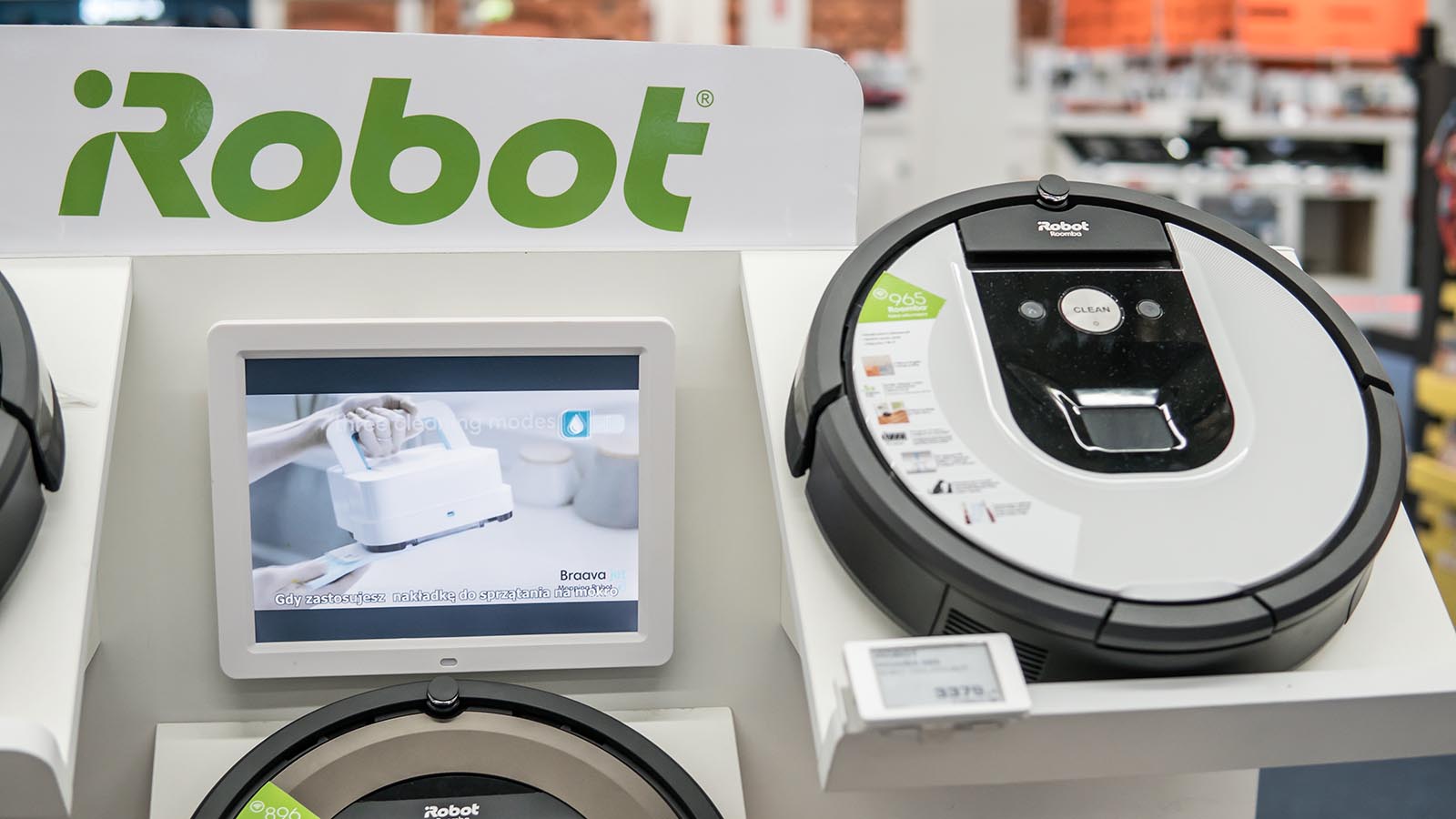 An iRobot (IRBT stock) Roomba inside Saturn electronic store