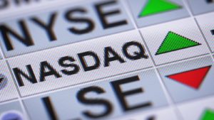 Nasdaq in focus accompanied by a green arrow and the word "NYSE"