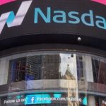 Bright signs for Nasdaq (NDAQ) cover the Nasdaq building in Times Square. Best Nasdaq stocks for long haul