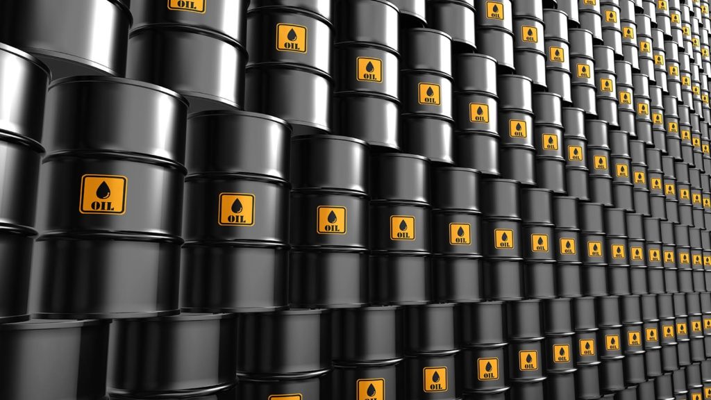 oil stocks: stacks of oil barrels