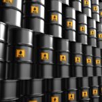 oil stocks: stacks of oil barrels