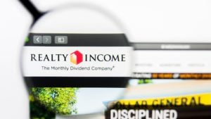 real estate income logo highlighted with a magnifying glass on a web browser