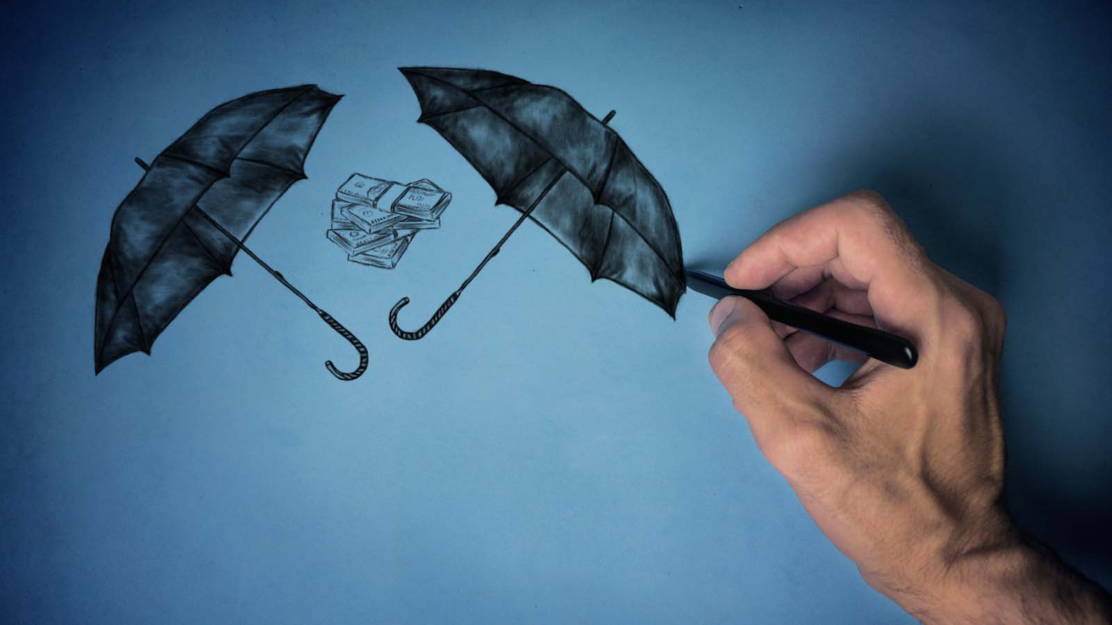 a hand drawing umbrellas covering money from rain