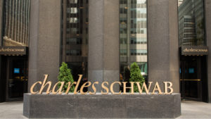 charles schwab sign outside of a building. SCHD stock