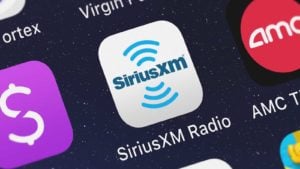 The Sirius XM (SIRI) mobile app logo on a smartphone screen. cheap stocks