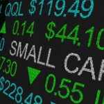 small-cap stocks: a ticker board that says "SMALL CAP" among various ticker increases. represents small-cap stocks to buy. Small-Cap Stock Picks