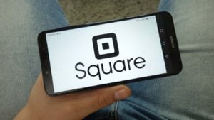 Square (SQ) logo displayed on a smartphone screen