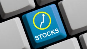 Stock button on computer keyboard (represents the best investment to start 2021. Stocks to buy)