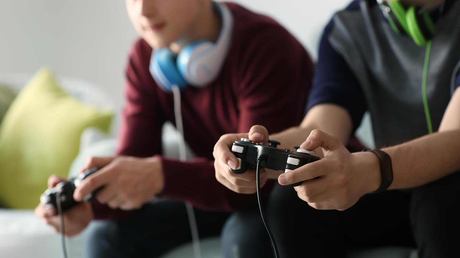 Image of two boys playing video games