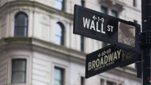 A close-up shot of the Wall Street street sign representing Midday Market Update.