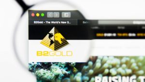 虫眼鏡で拡大した Web ブラウザ上の b2gold (BTG) ロゴ