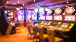 a room of slot machines in a casino to represent casino stocks