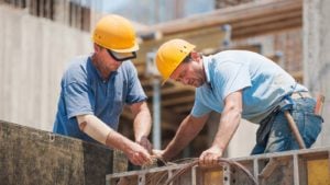 two construction workers on the construction site