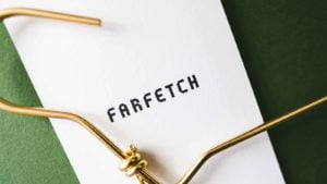 farfetch (FTCH) logo next to a hanger. undervalued stocks