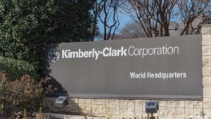 Kimberly Clark (KMB) sign, positioned outside the world headquarters’ main entrance. safe stocks
