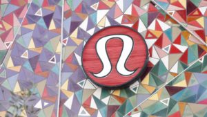 the lululemon (LULU stock) logo on a mosaic-style wall
