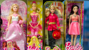 Four Barbie dolls from Mattel (MAT) are lined up in boxes.
