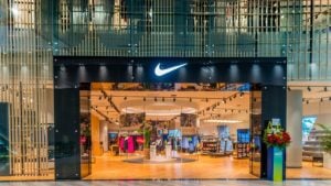 A Nike (NKE stock) storefront with the logo over the doorway