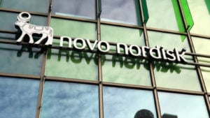 Novo Nordisk logo on the side of a building