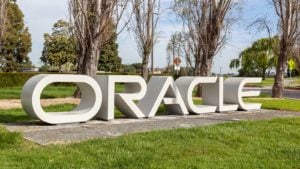 ORCL stock: a 3-dimensional Oracle sign in an outdoor setting