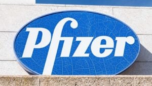 The Pfizer Corporation (PFE) logo on the Pfizer corporate building.  Pfizer is an American pharmaceutical company.