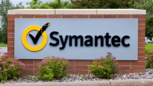 The logo for Symantec is seen on a rectangular brick sign.
