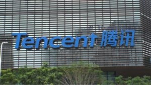 Tencent (TCEHY) sign on Tencent headquarters in Shenzhen, China. represents artificial intelligence stocks