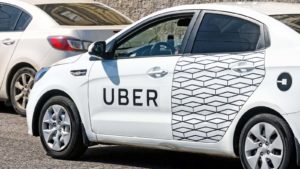 An Uber-branded car representing UBER stock.