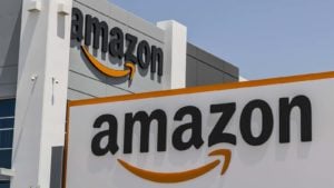 Streaming Stocks to Buy: Two Amazon (ticker: AMZN) marquees displayed on adjacent buildings 