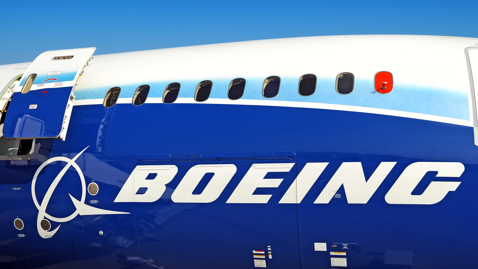 Boeing (BA stock) logo on the side of an airplane