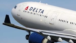 Delta (ticker: DAL) branded commercial aircraft taking off