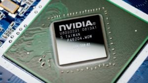 Nvidia (NVDA) logo on a microchip. stocks for earnings volatility