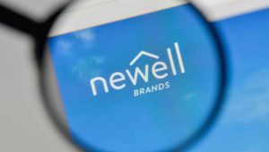 A magnifying glass zooms in on the Newell Brands (NWL) website.